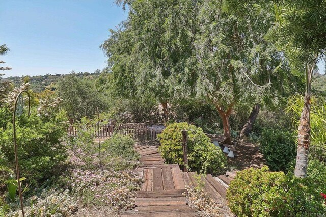 view of yard with a wooden deck