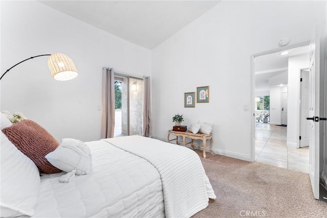 carpeted bedroom featuring high vaulted ceiling, multiple windows, and baseboards