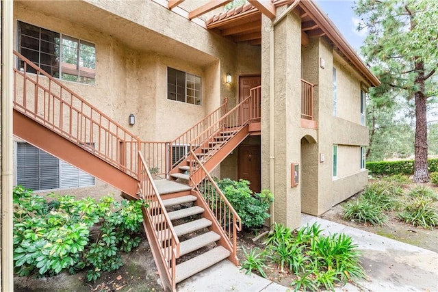 view of building exterior featuring stairway