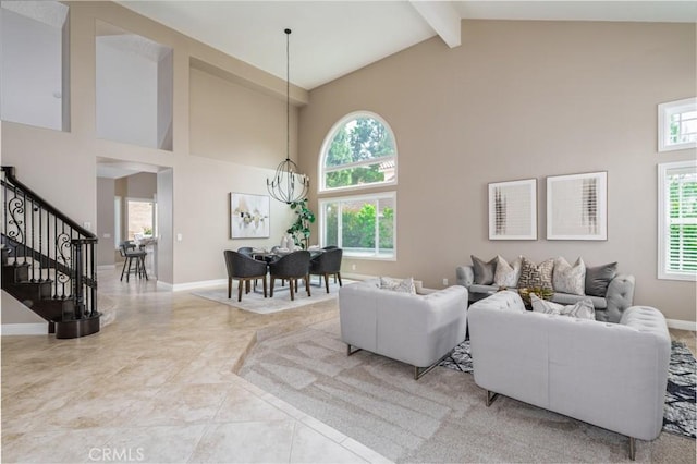 24661 Las Patranas, Yorba Linda, CA 92887 - living room with beam ceiling, baseboards, high vaulted ceiling, stairway, and a notable chandelier