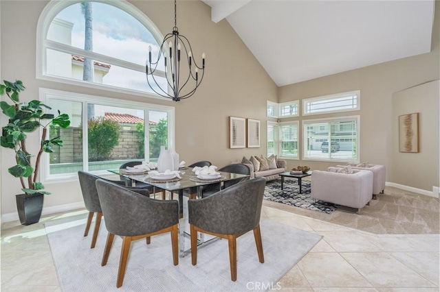 24661 Las Patranas, Yorba Linda, CA 92887 - dining area with baseboards, light tile patterned floors, a notable chandelier, and high vaulted ceiling