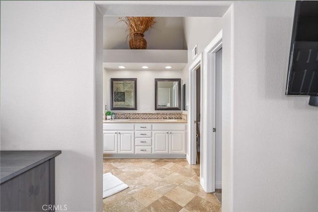 24661 Las Patranas, Yorba Linda, CA 92887 - full bathroom featuring double vanity, stone finish floor, a sink, and visible vents