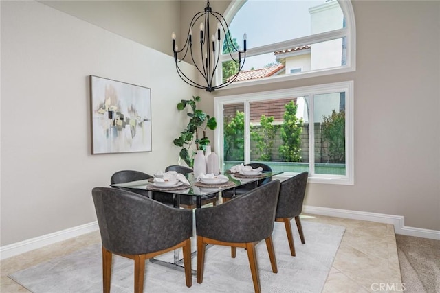 24661 Las Patranas, Yorba Linda, CA 92887 - tiled dining area with a towering ceiling, baseboards, and a chandelier