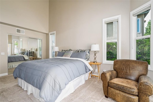 24661 Las Patranas, Yorba Linda, CA 92887 - bedroom with light carpet, baseboards, a towering ceiling, visible vents, and a closet