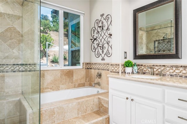 24661 Las Patranas, Yorba Linda, CA 92887 - full bath with vanity, a garden tub, a healthy amount of sunlight, and tiled shower