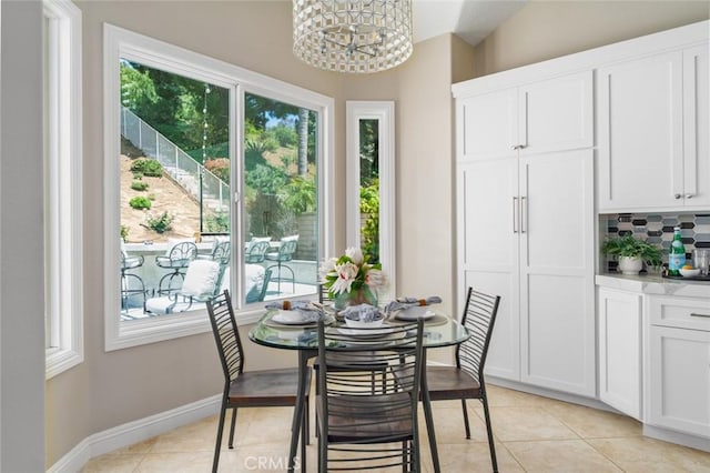 24661 Las Patranas, Yorba Linda, CA 92887 - dining space featuring baseboards, a notable chandelier, and light tile patterned floors