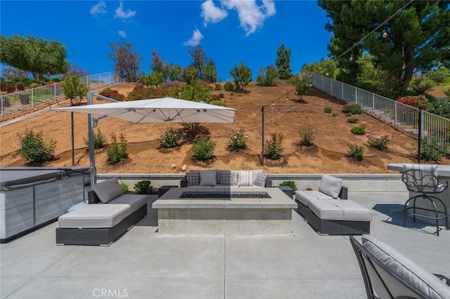 24661 Las Patranas, Yorba Linda, CA 92887 - view of patio / terrace with a hot tub, a fenced backyard, and an outdoor living space with a fire pit