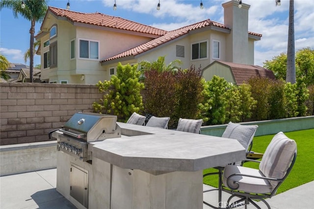 24661 Las Patranas, Yorba Linda, CA 92887 - view of patio / terrace featuring area for grilling, exterior kitchen, fence, and outdoor dry bar