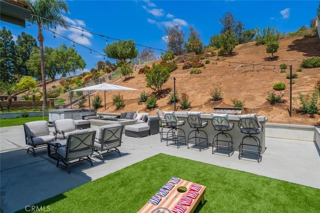 24661 Las Patranas, Yorba Linda, CA 92887 - view of patio with an outdoor living space, fence, and outdoor dry bar