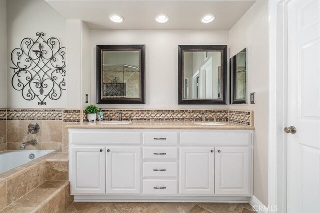 24661 Las Patranas, Yorba Linda, CA 92887 - full bathroom featuring double vanity, a sink, and a bath
