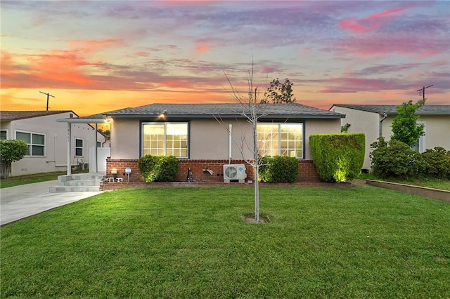4161 Lynd Ave, Arcadia, CA 91006 - view of front of home with brick siding, stucco siding, a lawn, and ac unit