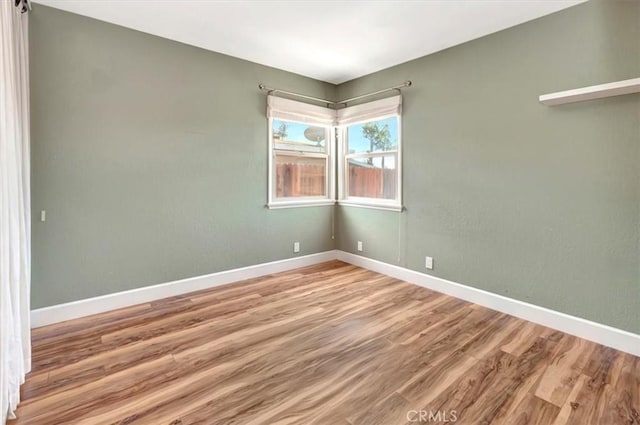 34605 Calle Portola, Dana Point, CA 92624 - unfurnished room featuring baseboards and light wood finished floors