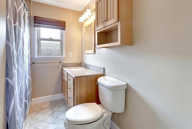 34605 Calle Portola, Dana Point, CA 92624 - bathroom with vanity, toilet, baseboards, tile patterned floors, and a shower with curtain