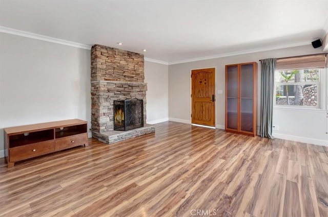 34605 Calle Portola, Dana Point, CA 92624 - unfurnished living room featuring baseboards, ornamental molding, wood finished floors, and a fireplace