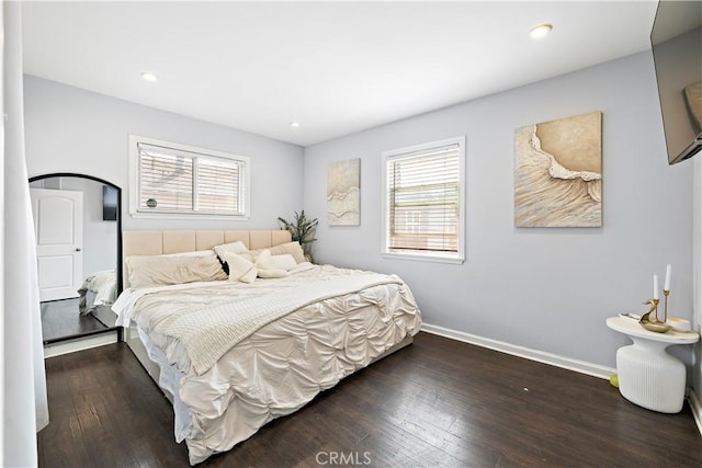 bedroom with baseboards, recessed lighting, and hardwood / wood-style floors