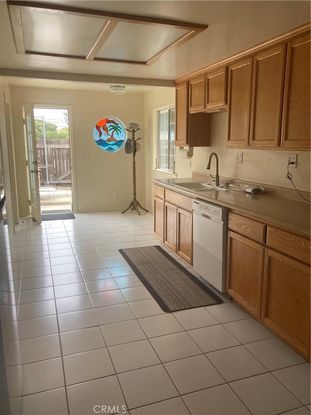 2235 Willow Rd, Arroyo Grande, CA 93420 - kitchen with dishwasher, a sink, light tile patterned flooring, and brown cabinetry
