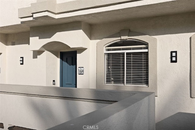 exterior space featuring stucco siding
