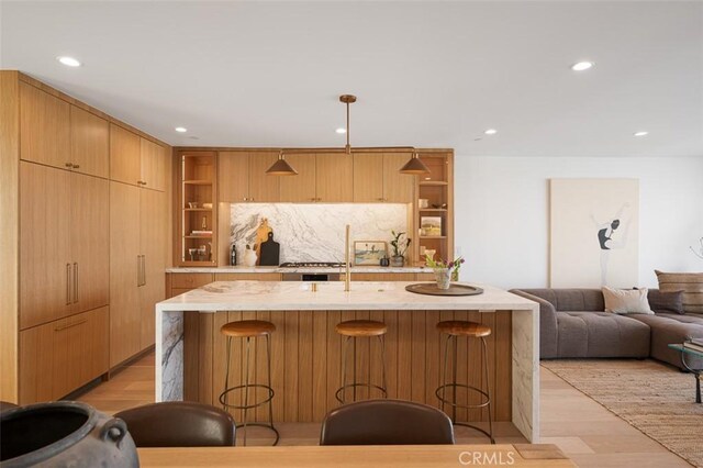 207 Canal St, Newport Beach, CA 92663 - kitchen featuring open shelves, light countertops, light wood-style floors, and recessed lighting