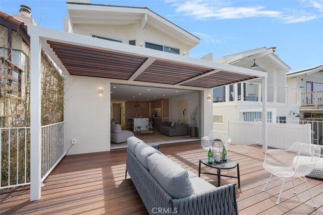 207 Canal St, Newport Beach, CA 92663 - wooden deck with an outdoor living space