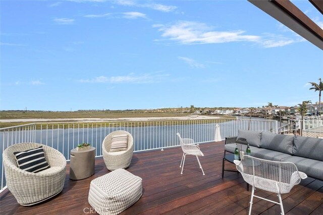 207 Canal St, Newport Beach, CA 92663 - wooden terrace with a water view