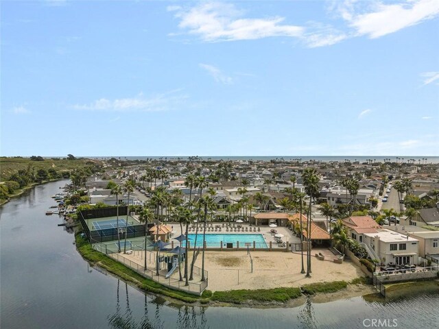 207 Canal St, Newport Beach, CA 92663 - aerial perspective of suburban area featuring a nearby body of water and a pool area