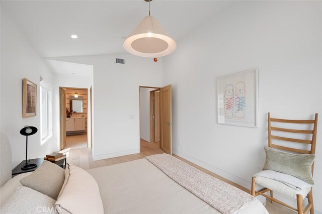 207 Canal St, Newport Beach, CA 92663 - bedroom featuring light wood-style flooring, connected bathroom, high vaulted ceiling, and recessed lighting