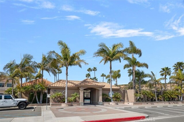 207 Canal St, Newport Beach, CA 92663 - view of property with uncovered parking