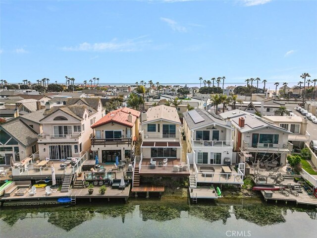 207 Canal St, Newport Beach, CA 92663 - aerial perspective of suburban area featuring a large body of water