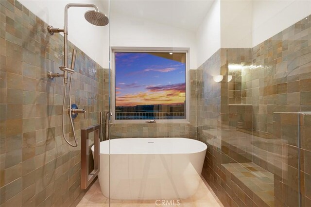 207 Canal St, Newport Beach, CA 92663 - bathroom with tile walls, a tile shower, and a freestanding tub