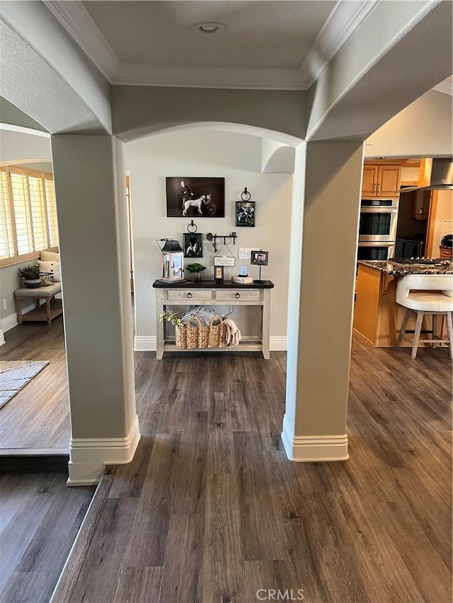 305 W 23rd St, Upland, CA 91784 - corridor featuring crown molding, baseboards, and dark wood finished floors