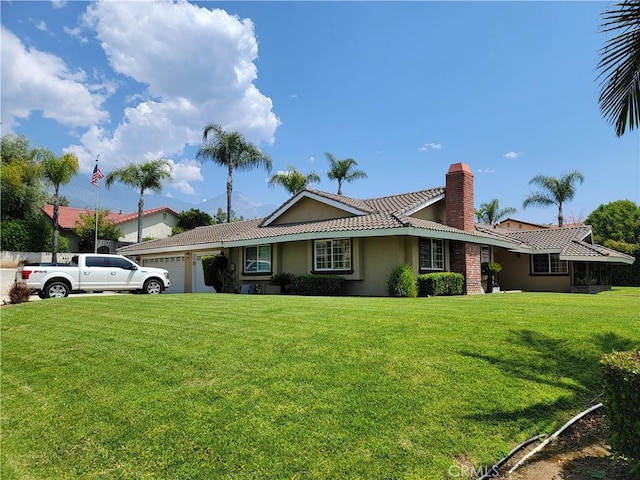 305 W 23rd St, Upland, CA 91784 - single story home featuring a garage, a front lawn, stucco siding, a chimney, and a tiled roof