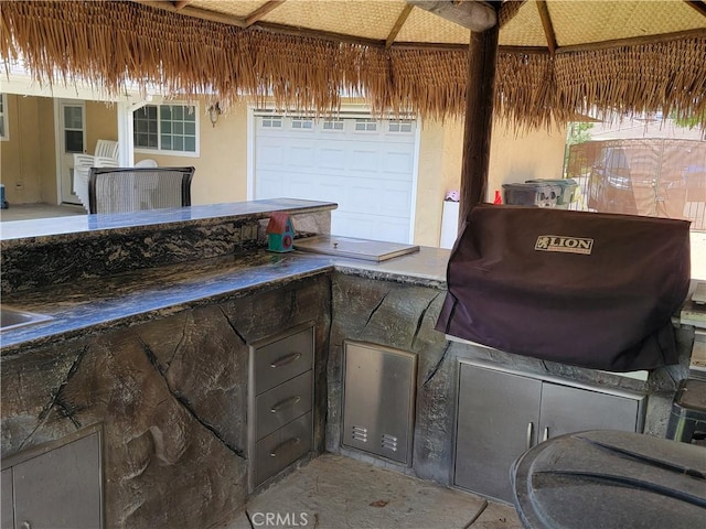 305 W 23rd St, Upland, CA 91784 - view of patio with exterior kitchen and a grill