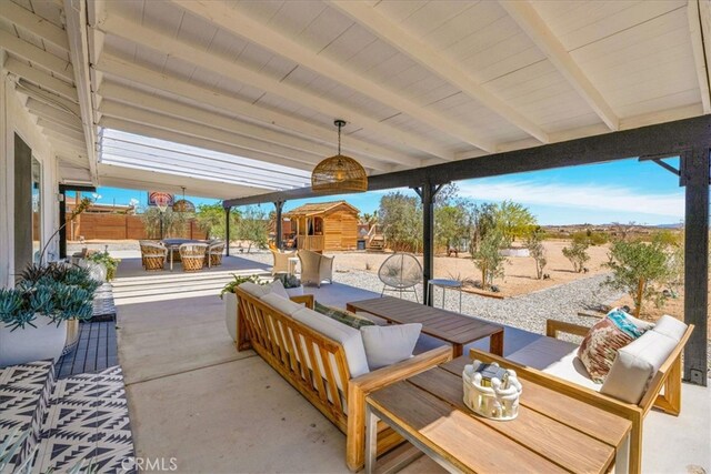 view of patio with an outdoor hangout area, outdoor dining area, and fence private yard