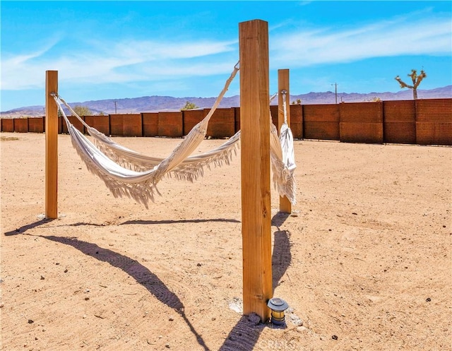 2837 Border Ave, Joshua Tree, CA 92252 - view of yard featuring a mountain view and fence