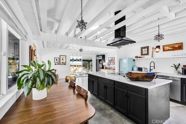 2837 Border Ave, Joshua Tree, CA 92252 - kitchen with dark cabinetry, stainless steel dishwasher, beamed ceiling, island range hood, and a center island