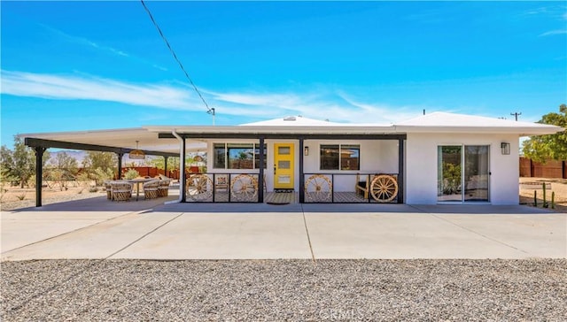2837 Border Ave, Joshua Tree, CA 92252 - back of property featuring a patio area and stucco siding