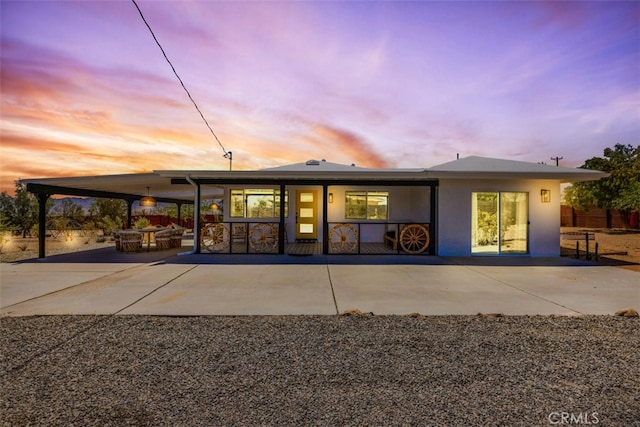 2837 Border Ave, Joshua Tree, CA 92252 - rear view of house featuring a patio area and stucco siding