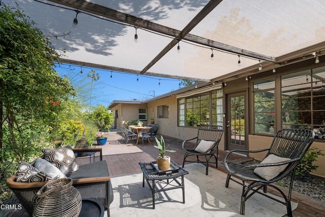view of patio / terrace featuring an outdoor living space and outdoor dining space