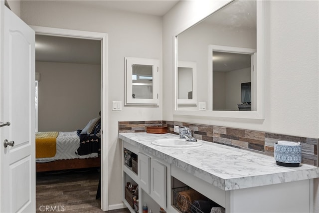 5736 La Porte Rd, Bangor, CA 95914 - bathroom featuring vanity, wood finished floors, and connected bathroom