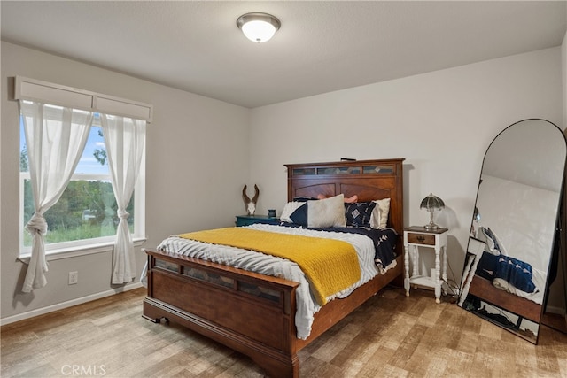 5736 La Porte Rd, Bangor, CA 95914 - bedroom with baseboards and light wood-style floors