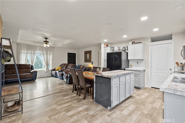 5736 La Porte Rd, Bangor, CA 95914 - kitchen with freestanding refrigerator, ceiling fan, light wood finished floors, and light countertops