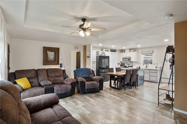 5736 La Porte Rd, Bangor, CA 95914 - living room featuring a ceiling fan, visible vents, a raised ceiling, recessed lighting, and light wood-style flooring