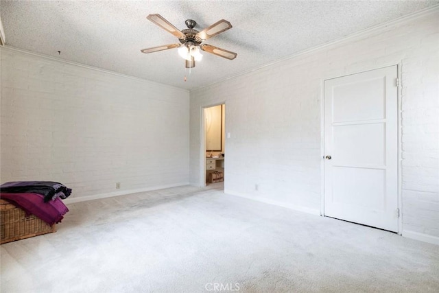 1422 W Riverside Dr, Burbank, CA 91506 - unfurnished bedroom with baseboards, ornamental molding, carpet, and a textured ceiling