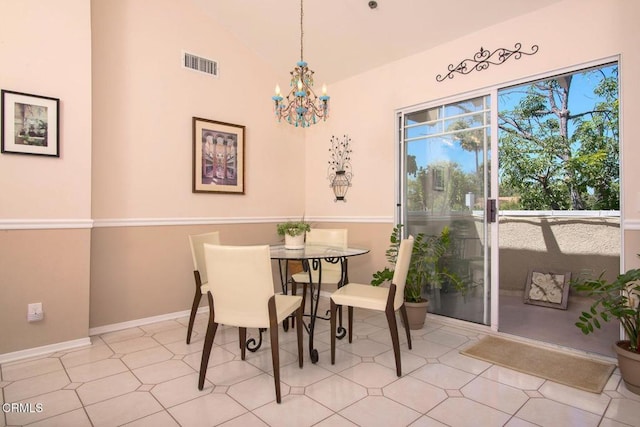 dining room with tile patterned floors, a chandelier, baseboards, lofted ceiling, and visible vents