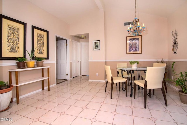 dining area with an inviting chandelier, baseboards, vaulted ceiling, light floors, and visible vents