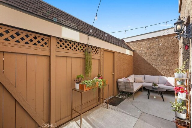 30 Starfish Ct Unit 14, Newport Beach, CA 92663 - view of patio / terrace featuring fence and outdoor lounge area