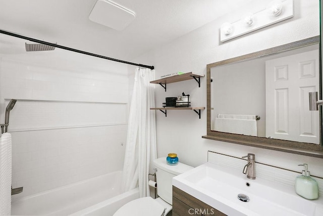 bathroom featuring vanity, shower / tub combo, and toilet