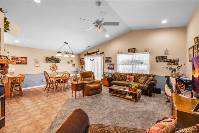 living area with a ceiling fan, vaulted ceiling, and recessed lighting
