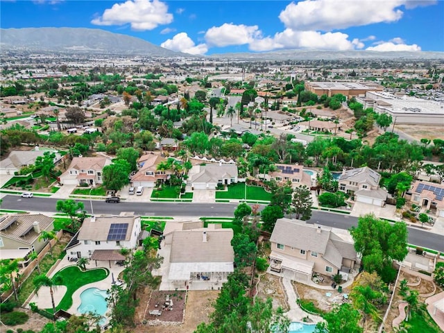 bird's eye view featuring a mountain view and a residential view