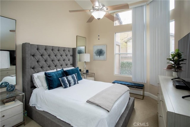 bedroom featuring carpet floors and baseboards